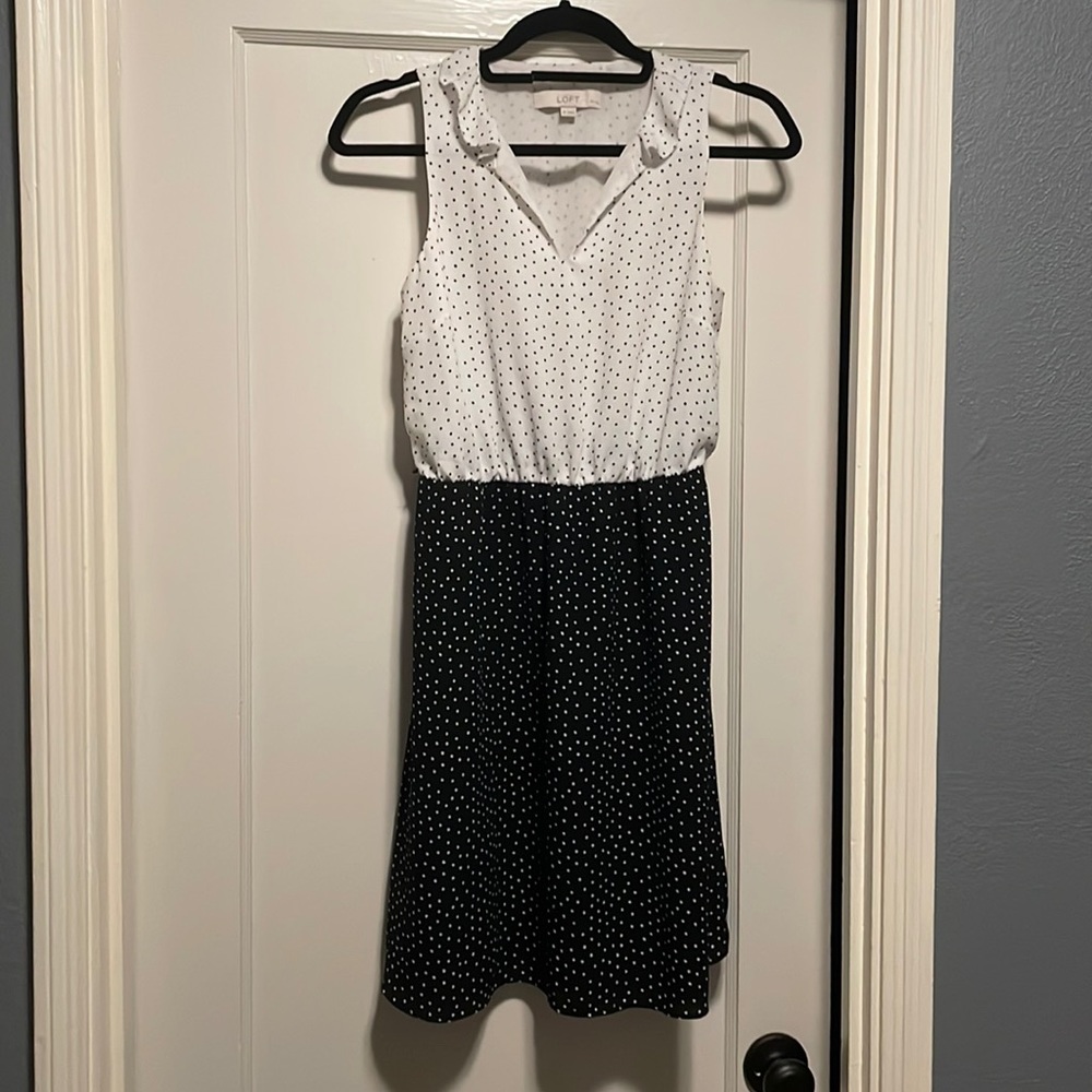 Sleeveless Loft black and white polka dot dress in size 4 PETITE